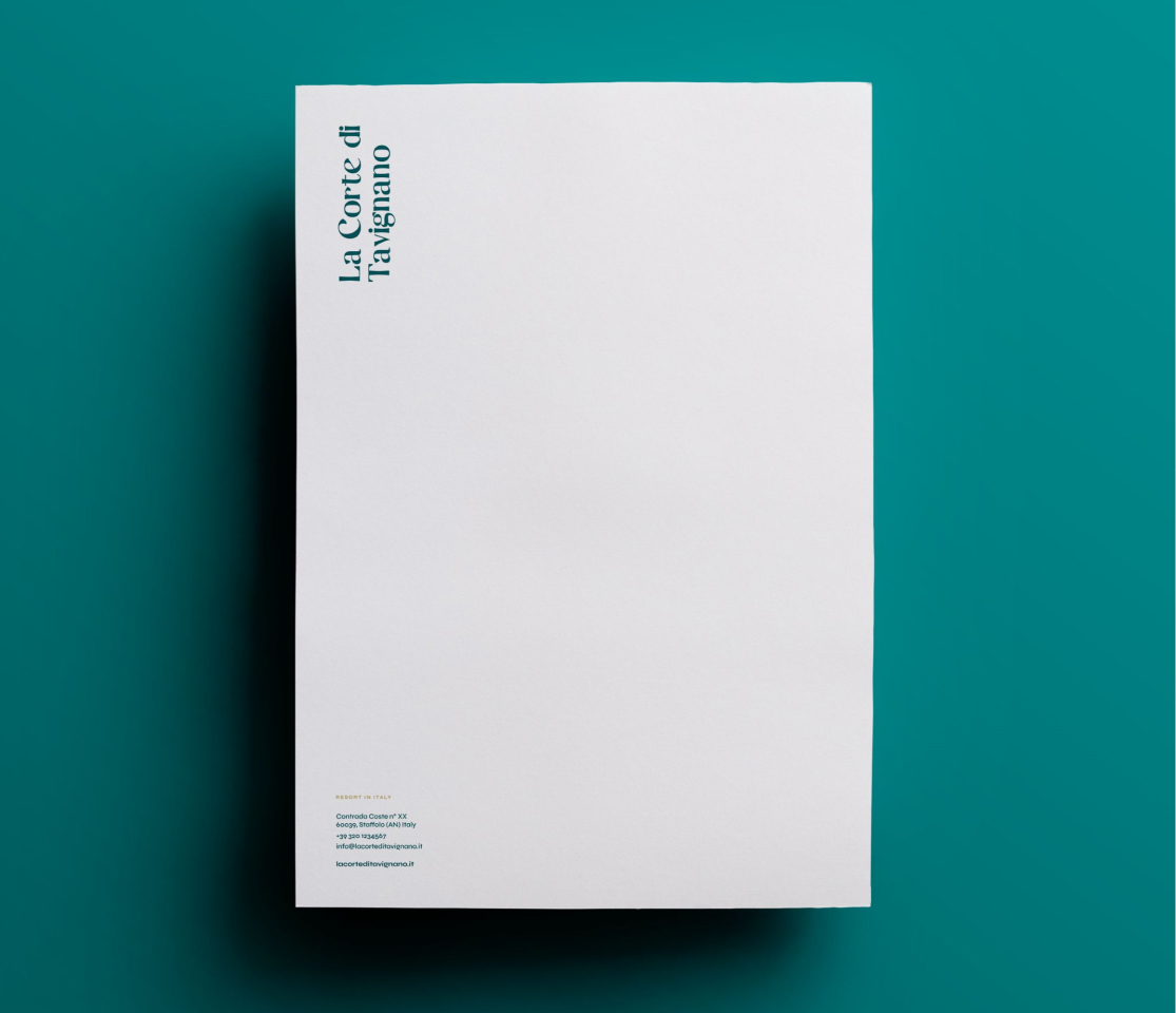 White La Corte di Tavignano brochure on a teal background